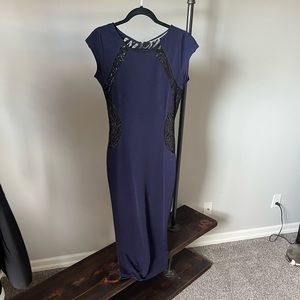 Navy blue cocktail dress with black lace details